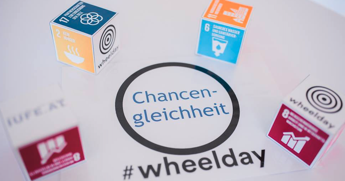 Abbildung von Würfeln mit der Aufschrift "Wheelday" © Bild: Wheelday